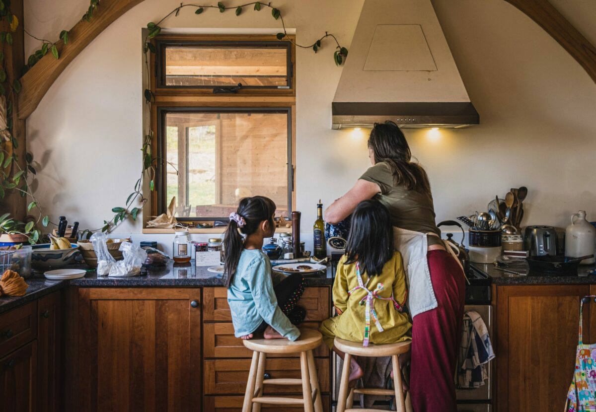 Mom,Making,Pancakes,Breakfast,For,Two,Young,Adopted,Indian,Daughters